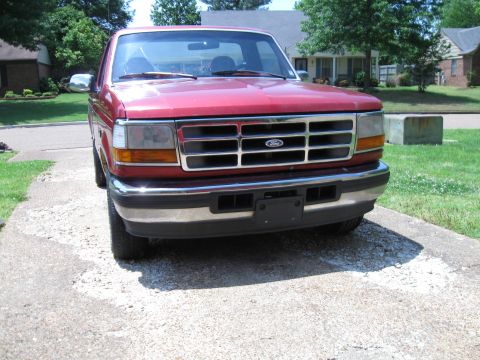1996 Ford F-150 - Front view of a red 1996 Ford F-150 pickup truck.