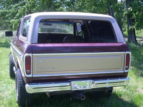 1979 Ford Bronco - The rear of a Ford Bronco shows its taillights and tailgate with the Ford logo.