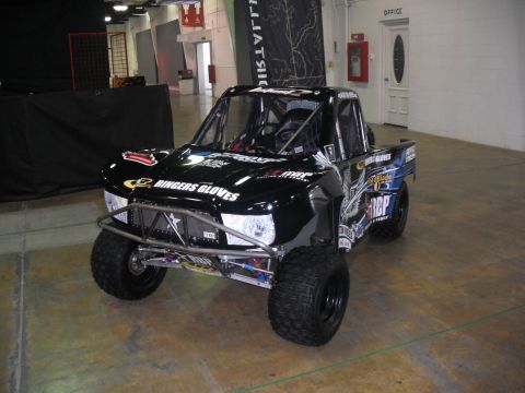 1986 Ford Bronco - This off-road race truck is heavily modified for competition and features numerous sponsor decals.