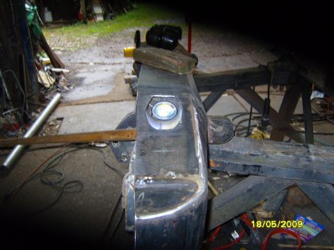 1989 Ford Bronco - Custom rear bumper fabrication in progress, showing welding and a light mounting point.