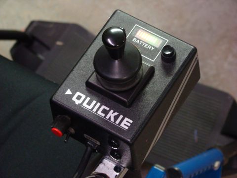 1948 Jeep Wrangler - Close-up of a Quickie brand joystick controller, likely for a powered wheelchair.