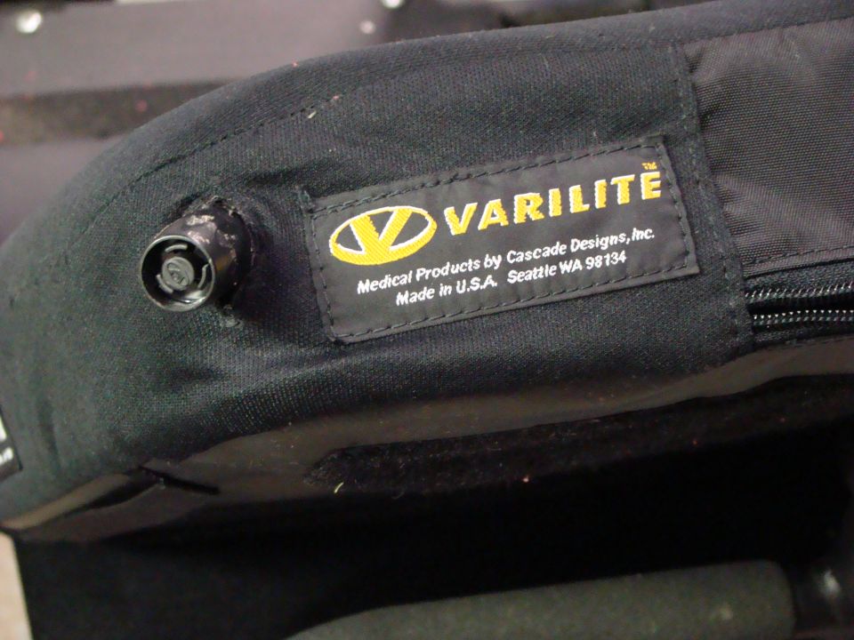 Black fabric part with VARILITE label, made in USA