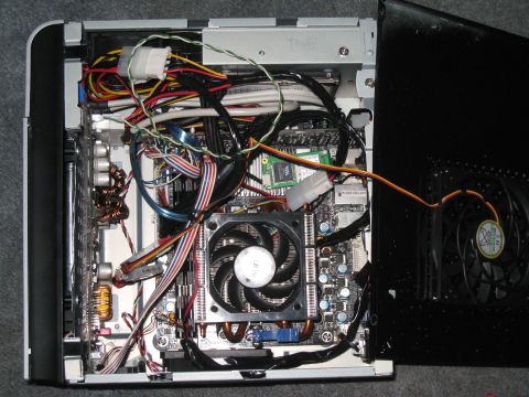 2007 Subaru Impreza - The interior of a computer case reveals complex wiring and internal components.