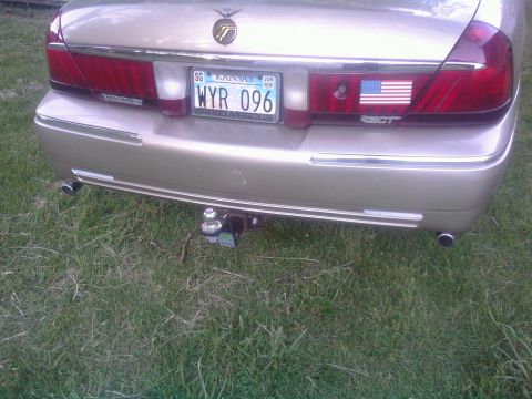 2000 Mercury Grand Marquis - Rear view of a 2000 Mercury Grand Marquis, equipped with a trailer hitch and Kansas license plate.