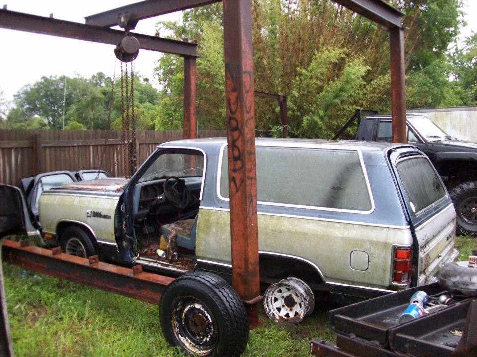 1988 Dodge Power Ram SUV side view, two-tone paint, on trailer