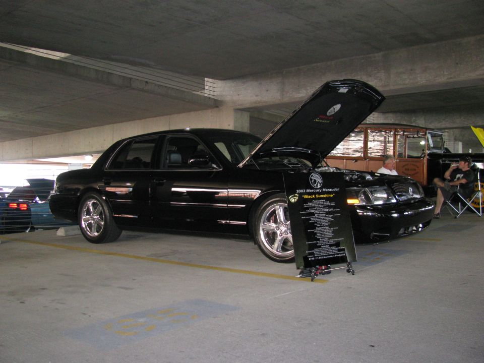 2003 Mercury Marauder with hood open, displaying information board