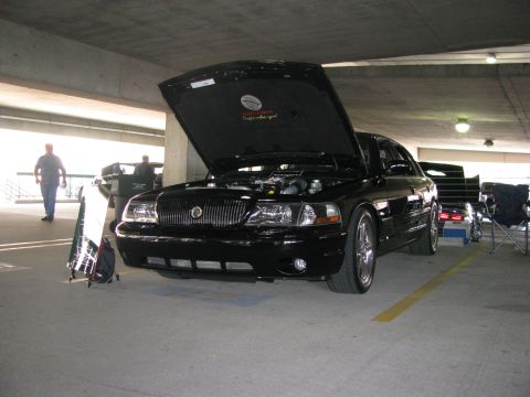 2003 Mercury Marauder - Black 2003 Mercury Marauder at a car show, hood open to display the engine.