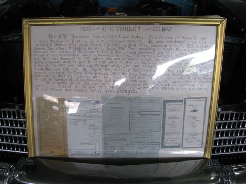 2003 Mercury Marauder - A framed document provides the history and details of a 1958 Chevrolet Delray, including ownership and mileage records.