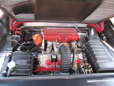 2003 Mercury Marauder - Engine bay view shows a red intake manifold with "QUATTROVALVOLE" text.