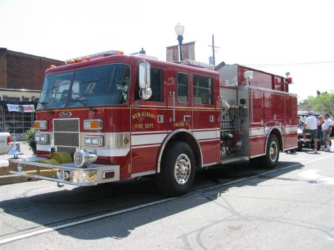 2003 Mercury Marauder - A red fire truck labeled 'New Albany Fire Dept. Engine 3' is parked on the street.