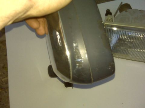 1995 Ford Bronco - Car fender corner and headlight assembly shown, with Supermotors.net branding at the bottom.