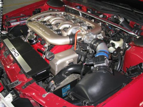 2003 Mercury Marauder - The engine bay features a prominent "SHO" badge on a black cover, indicating a performance variant.