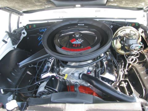 2003 Mercury Marauder - Close-up view of a vehicle's engine bay, highlighting the air cleaner and other engine components.