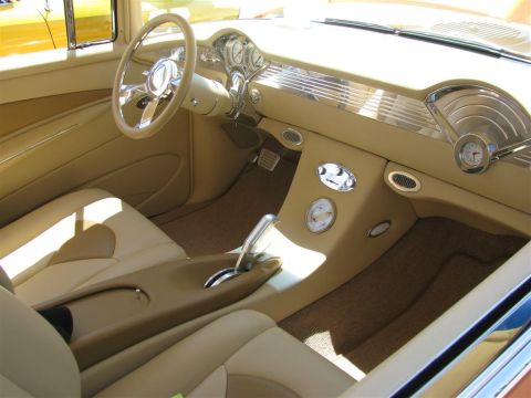 2003 Mercury Marauder - Interior view of a custom car with tan upholstery and chrome accents.
