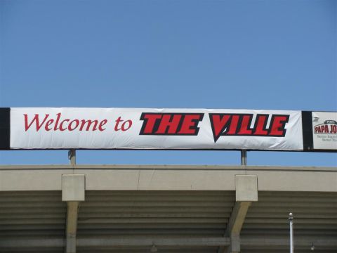 2003 Mercury Marauder - A banner welcomes visitors to "THE VILLE" with a Papa John's advertisement visible on the right side.