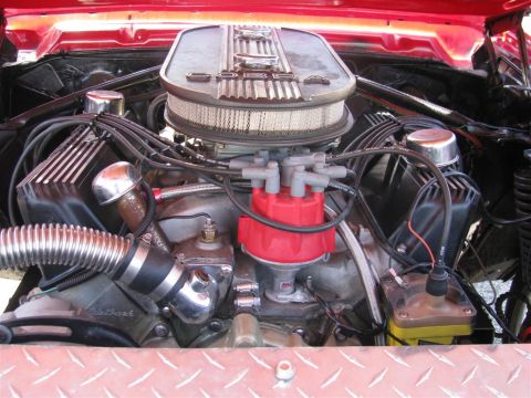 2003 Mercury Marauder - Close-up view of a vehicle's engine bay, showing various components and wiring.