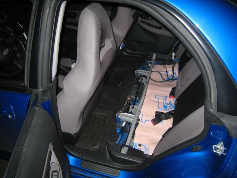 2007 Subaru Impreza - Custom electronics are visible in the interior of this blue vehicle, which features racing seats.