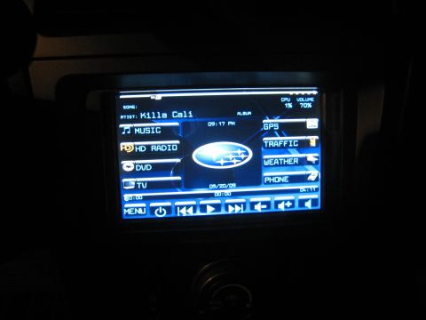 2007 Subaru Impreza - Infotainment system screen with Subaru logo and various media and navigation options visible.