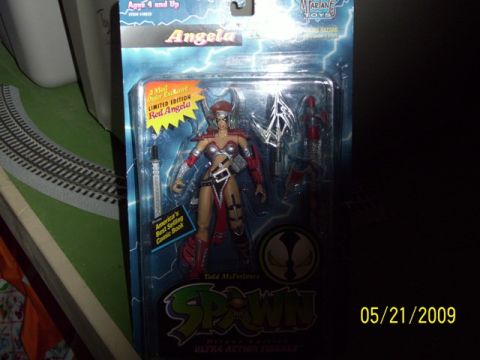 1991 Ford Bronco - Action figure packaging for 'Angela' from Spawn, dated 05/21/2009.