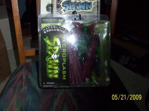 1991 Ford Bronco - A Spawn Necroplasm action figure is displayed in its original packaging.