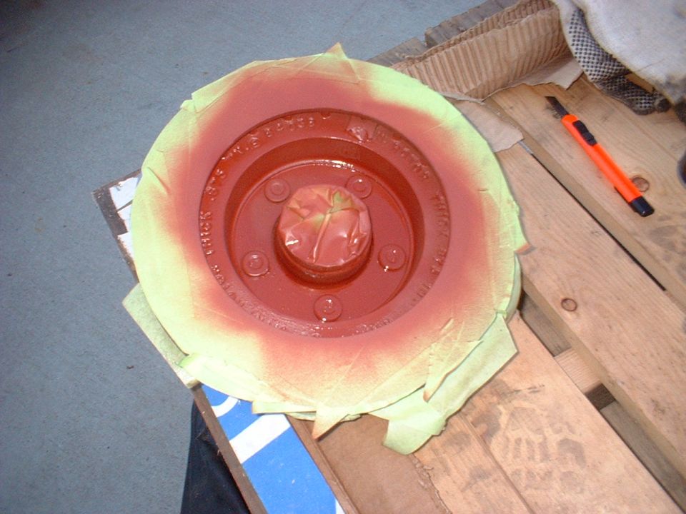 New rotors were cleaned, painted with rustolem primer and then painted in cast iron grey paint. RUST SUCKS !!!!!!