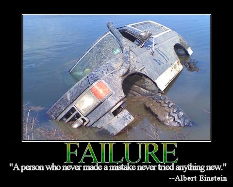 1990 Ford Bronco - A vehicle is submerged in water, with only the top and snorkel visible above the surface.