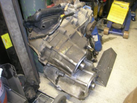 1996 Ford Bronco - A transmission unit is shown, with visible part numbers and markings.