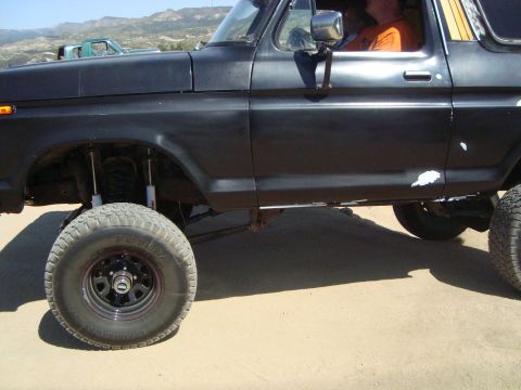 1986 Ford Bronco - This lifted black Ford Bronco appears to be from the late 1970s, not 1986.