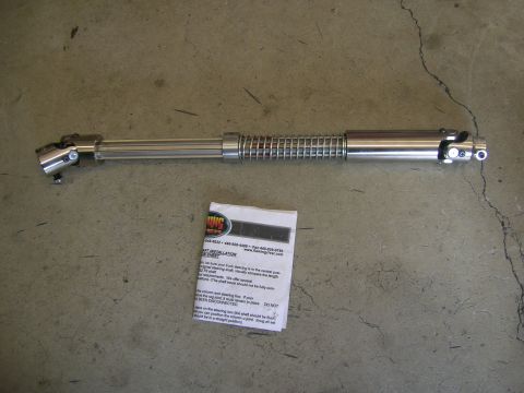 1996 Ford Bronco - Steering shaft assembly with accompanying installation guide for vehicle repair or modification.
