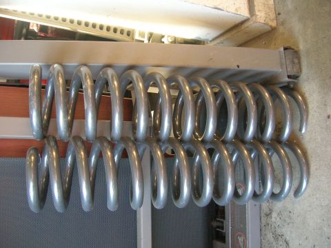 1996 Ford Bronco - A pair of suspension coil springs are displayed, likely for sale.