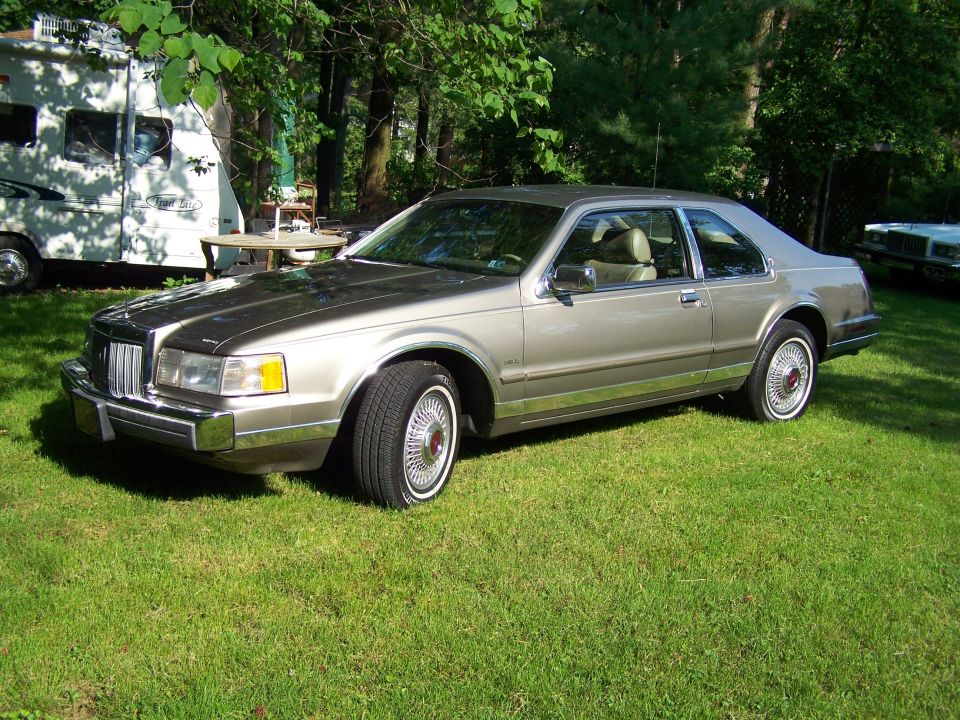 1987 Lincoln Mark VII coupe, tan, 3q front view