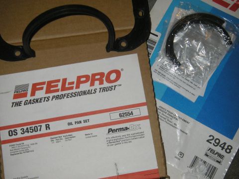 1979 Ford Bronco - Parts for an oil pan gasket set and a rear main seal are shown, with the Fel-Pro OS 34507 R and 2948 part numbers visible.