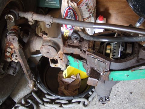 2002 Jeep TJ - This image shows the internal gears of a Jeep Dana 44 axle differential, with the cover removed for inspection or repair.