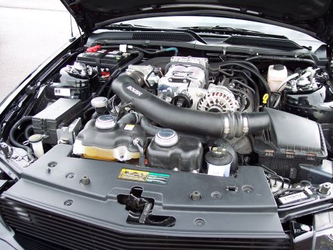 1972 Ford Ranchero - Engine bay details showing a Roush supercharger and associated components.