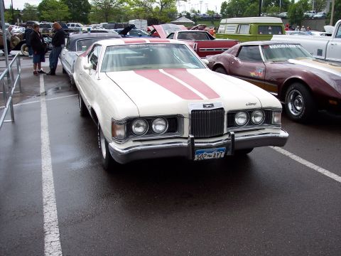 1972 Ford Ranchero - This 1972 Mercury Cougar XR-7 features a distinctive grille and red racing stripes on its hood.