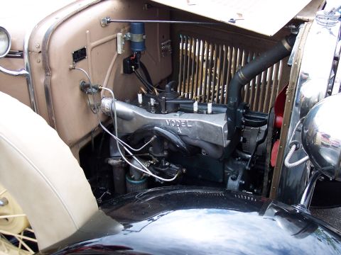 1972 Ford Ranchero - Close-up of a Ford Model A engine, showing the V8 engine block and surrounding components.