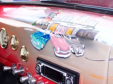 1972 Ford Ranchero - The dashboard features airbrushed artwork of three vintage cars, complete with gauges and a modern stereo system.