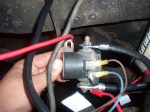 1978 Jeep CJ5 - A starter solenoid is shown with multiple wires connected, likely from a vehicle's electrical system.