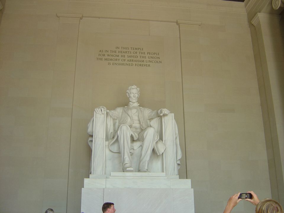Lincoln Memorial statue with inscription above