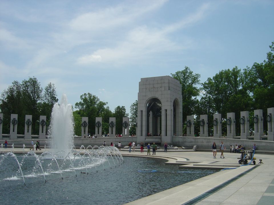National World War II Memorial with fountain and arched monument