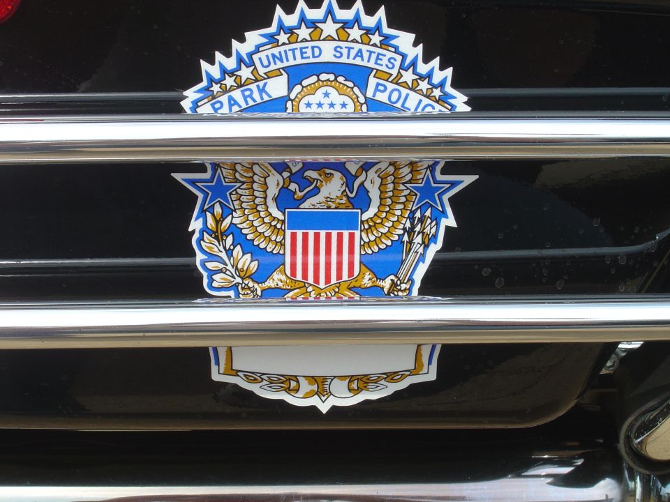US Park Police emblem on a black vehicle grille