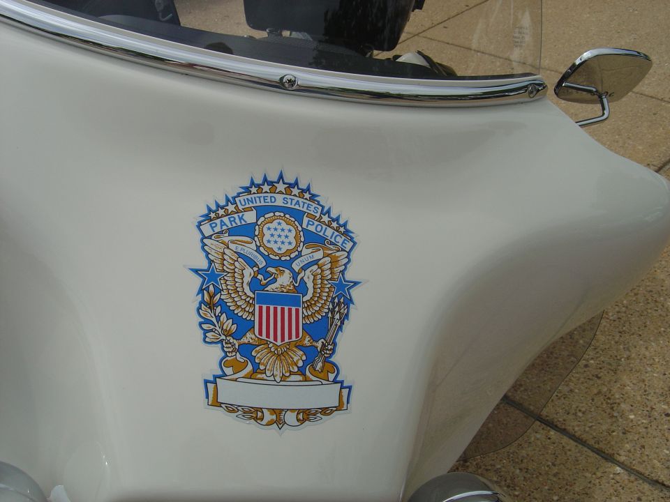 White motorcycle fairing with United States Park Police emblem