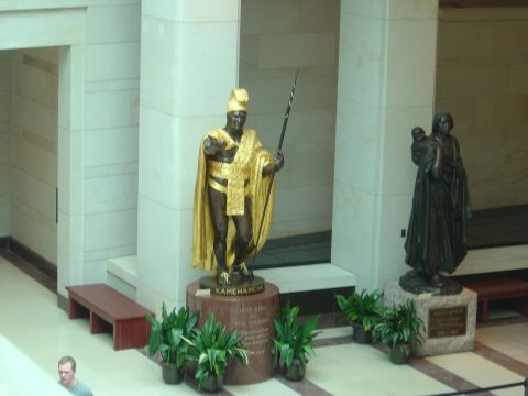 2001 Ford Crown Victoria - A statue of Kamehameha I stands prominently, accompanied by another bronze sculpture of a woman with a child.