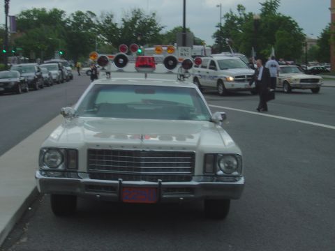 2001 Ford Crown Victoria - This vehicle appears to be a vintage police car, not a 2001 Ford Crown Victoria.