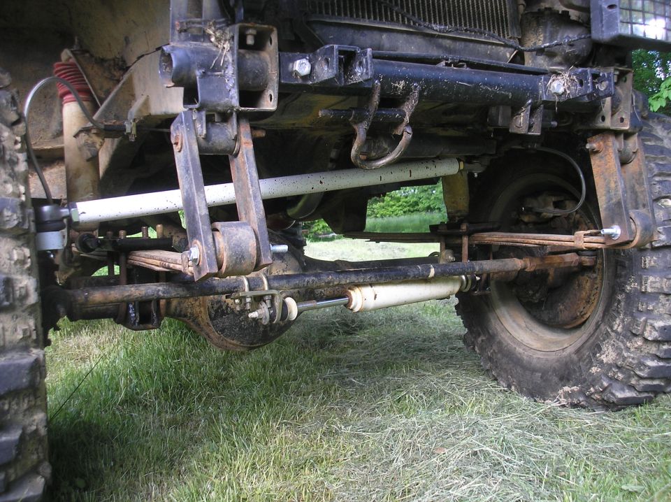 1987 Suzuki Samurai front suspension with leaf springs, shocks, and sway bar