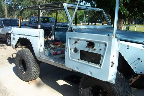 1976 Ford Bronco - This Ford Bronco appears to be in the process of being restored, with its doors removed and interior exposed.