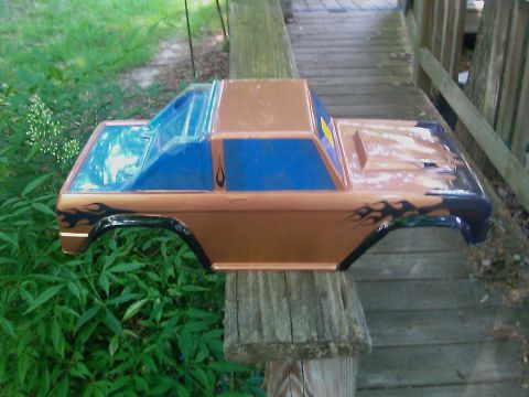 1996 Ford Bronco - This is a custom-painted RC car body shell, likely for a truck or SUV, with flame graphics.