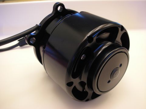 1992 Ford Crown Victoria - Close-up of a black electric motor, likely for automotive use.
