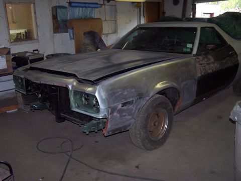1975 Ford Ranchero - This 1975 Ford Ranchero is undergoing bodywork, showing its primer finish and missing headlights.