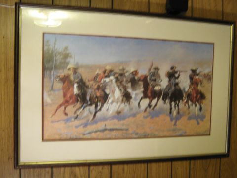 2000 Mercury Grand Marquis - Framed artwork depicting a group of cowboys on horseback in a dynamic outdoor scene.